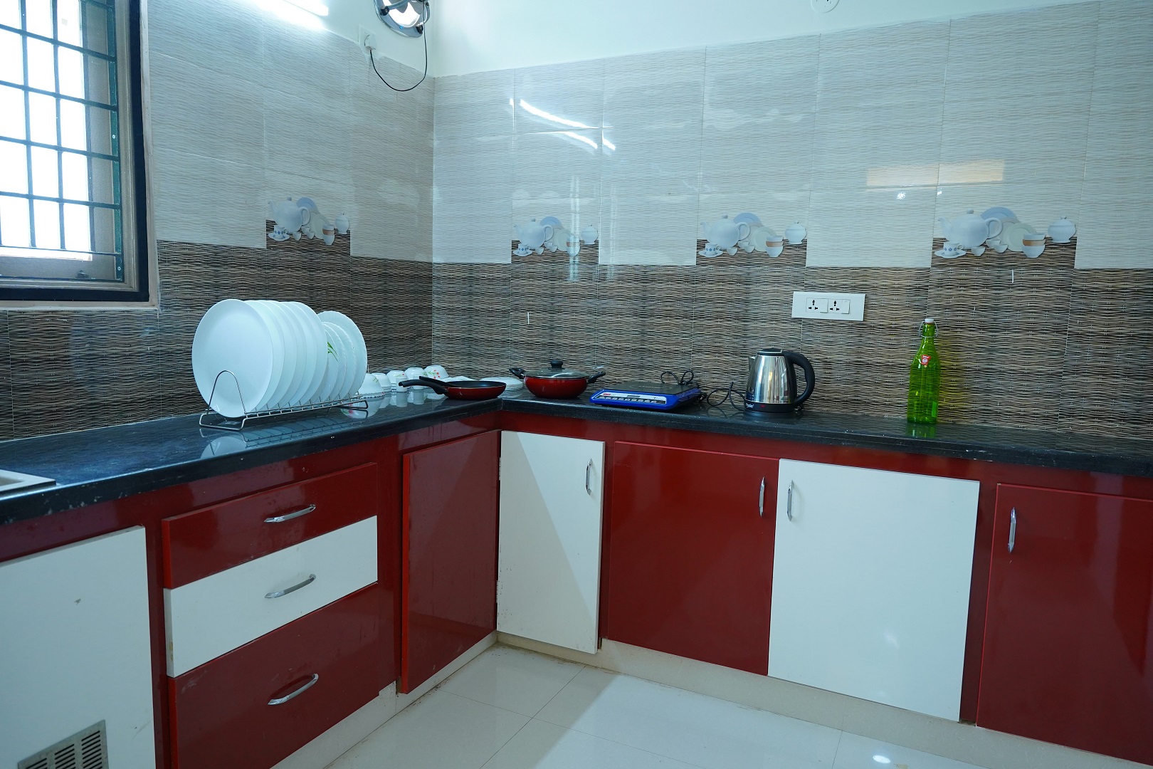 Kitchen at Priya Woodz Homestay