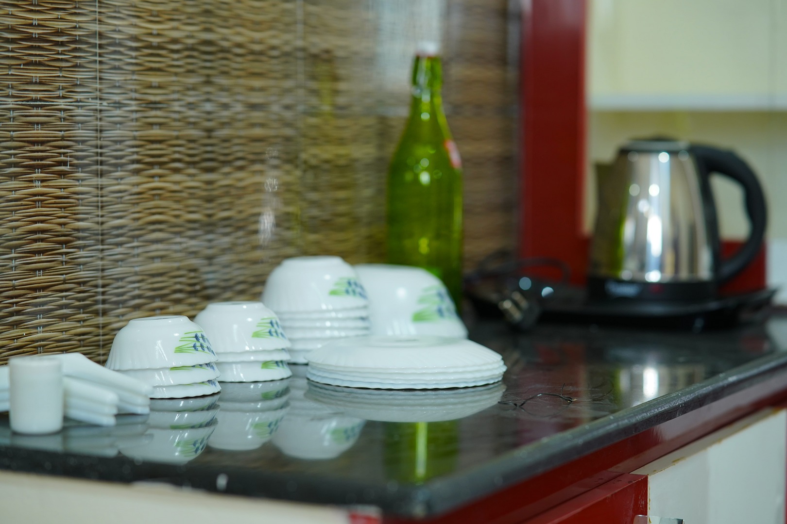 Kitchen amenities at Priya Woodz Homestay